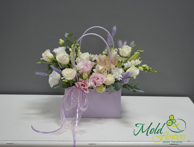 Purple bouquet with roses, lisianthus, and chrysanthemum photo